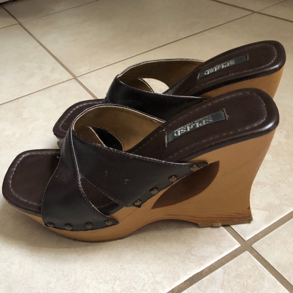 Dark Brown leather and wood heeled sandals.